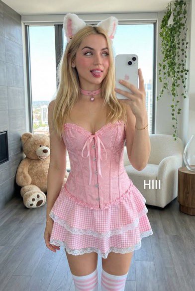 Example image 1 for Playful Mirror Selfie with Cat Ears and Pink Brocade Corset